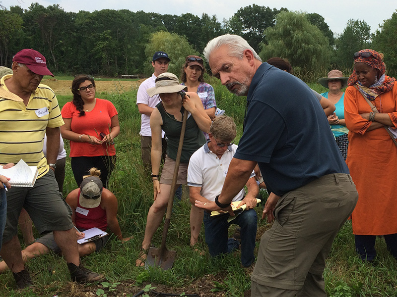 Ray Archuleta, National Resources Conservation Service soil expert, conducts a workshop on soil health at our farm in July. He was pleased with the levels of soil biology, an indicator of soil health, that he found.