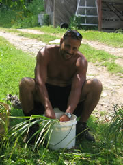 Danny washes garlic