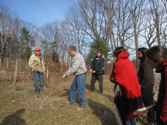 Jack Kittredge shows a group the proper way to prune blueberries. Taken on Saturday, March 14th, 2009